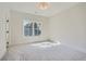 Bright bedroom with carpeted floors and a large window offering natural light at 4215 Tattnall Run, Acworth, GA 30101