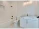 Modern bathroom with white cabinets, quartz countertop, and a soaking tub at 4215 Tattnall Run, Acworth, GA 30101