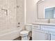 Bathroom with white vanity and tiled shower at 4215 Tattnall Run, Acworth, GA 30101