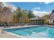 Resort-style pool with a large cabana and plenty of seating at 4215 Tattnall Run, Acworth, GA 30101