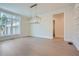 Dining room with chandelier and large window at 4215 Tattnall Run, Acworth, GA 30101