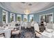 Elegant dining room with large windows and a chandelier at 4215 Tattnall Run, Acworth, GA 30101