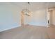 Bright dining room with chandelier and wainscoting at 4215 Tattnall Run, Acworth, GA 30101