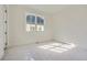 Bright bedroom with carpet, large window, and plenty of natural light at 4215 Tattnall Run, Acworth, GA 30101
