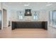 Modern kitchen with large island and black cabinets at 4215 Tattnall Run, Acworth, GA 30101