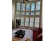 Bright living room featuring a large window wall and comfortable seating at 9904 Hamilton Dr, Douglasville, GA 30135