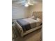 Spacious bedroom with a large bed and window coverings at 9904 Hamilton Dr, Douglasville, GA 30135