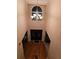 Two-story entryway with hardwood floors and a chandelier at 9904 Hamilton Dr, Douglasville, GA 30135