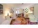 Living room with hardwood floors, antique furniture and view to dining room at 3081 Howell Mill Nw Rd # 3, Atlanta, GA 30327