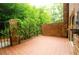 Private brick patio with lush green landscaping at 3081 Howell Mill Nw Rd # 3, Atlanta, GA 30327