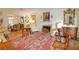 Spacious living room featuring hardwood floors, a fireplace, and antique furniture at 3081 Howell Mill Nw Rd # 3, Atlanta, GA 30327