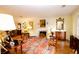 Spacious living room boasts hardwood floors, fireplace, and large windows at 3081 Howell Mill Nw Rd # 3, Atlanta, GA 30327