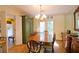 Formal dining room with hardwood floors, chandelier, and antique furniture at 3081 Howell Mill Nw Rd # 3, Atlanta, GA 30327