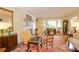 Spacious living room boasts hardwood floors, fireplace, and large windows at 3081 Howell Mill Nw Rd # 3, Atlanta, GA 30327