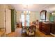 Formal dining room with hardwood floors, chandelier, and antique furniture at 3081 Howell Mill Nw Rd # 3, Atlanta, GA 30327