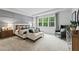 Large main bedroom with sitting area and wood dresser at 263 Arwen Drive Lot 65, Mcdonough, GA 30252