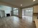 Open concept great room with sunroom and fireplace at 263 Arwen Drive Lot 65, Mcdonough, GA 30252