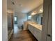 Spacious bathroom with double vanity, soaking tub, and separate shower at 263 Arwen Drive Lot 65, Mcdonough, GA 30252