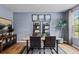 Dining room with wood table and gray walls at 263 Arwen Drive Lot 65, Mcdonough, GA 30252