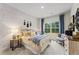 Charming bedroom with musical wallpaper and window at 263 Arwen Drive Lot 65, Mcdonough, GA 30252