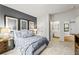 Main bedroom with gray walls and ensuite bathroom at 263 Arwen Drive Lot 65, Mcdonough, GA 30252