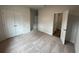 Bedroom with double door closet and access to bathroom at 263 Arwen Drive Lot 65, Mcdonough, GA 30252