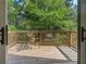 Private deck overlooking lush green trees at 1940 Fellowship Rd, Tucker, GA 30084