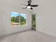 Bedroom with private deck access and treetop views at 1940 Fellowship Rd, Tucker, GA 30084