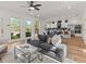 Open concept living and kitchen area with hardwood floors at 1940 Fellowship Rd, Tucker, GA 30084