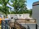 Spacious rooftop deck with built-in fireplace and ample space for entertaining at 1940 Fellowship Rd, Tucker, GA 30084