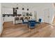 Modern kitchen with white cabinets, dark counter tops, and island at 1940 Fellowship Rd, Tucker, GA 30084