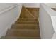 Carpeted staircase leading to the upper level at 2110 Glenwood Downs Dr, Decatur, GA 30035