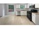 Kitchen with stainless steel appliances and white cabinets at 2110 Glenwood Downs Dr, Decatur, GA 30035