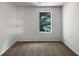 Bright bedroom with a window and carpet at 2110 Glenwood Downs Dr, Decatur, GA 30035