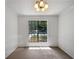 Bright dining room with large window and chandelier at 2110 Glenwood Downs Dr, Decatur, GA 30035