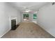 Living room with fireplace and access to deck at 2110 Glenwood Downs Dr, Decatur, GA 30035