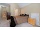 Bright bedroom with double bed and ample closet space at 4567 Brigade Ne Ct, Roswell, GA 30075