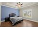 Guest bedroom with hardwood floors, and window with plantation shutters at 540 Carriage Ne Dr, Atlanta, GA 30328