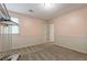 Simple bedroom with light pink walls and carpeted floors at 303 Walnutwood Trl, Roswell, GA 30075