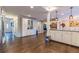 Bright kitchen with hardwood floors, white cabinets, and ample counter space at 303 Walnutwood Trl, Roswell, GA 30075
