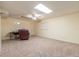 Unfinished basement with a carpeted floor, and plenty of space at 303 Walnutwood Trl, Roswell, GA 30075