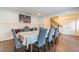 Formal dining room with hardwood floors and a large table at 303 Walnutwood Trl, Roswell, GA 30075