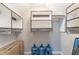 Large walk-in closet with ample shelving and hanging space at 303 Walnutwood Trl, Roswell, GA 30075