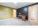 Spacious bedroom with a large bed, hardwood floors, and plenty of natural light at 303 Walnutwood Trl, Roswell, GA 30075