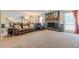 Living room with fireplace and large windows at 303 Walnutwood Trl, Roswell, GA 30075