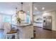 Spacious kitchen with granite countertops and stainless steel appliances at 303 Walnutwood Trl, Roswell, GA 30075
