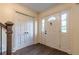 Bright and spacious entryway with hardwood floors and double doors at 303 Walnutwood Trl, Roswell, GA 30075