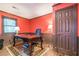 Spacious home office with hardwood floors and built in cabinetry at 303 Walnutwood Trl, Roswell, GA 30075