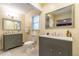 Elegant bathroom with double vanity, large mirror, and tile flooring at 303 Walnutwood Trl, Roswell, GA 30075