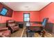 Elegant home office with leather seating, large desk and a flat screen TV at 303 Walnutwood Trl, Roswell, GA 30075